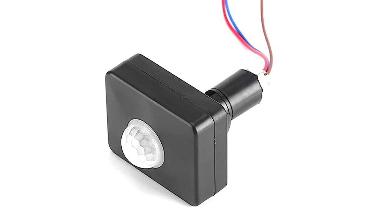 "Small black infrared sensor for lights."