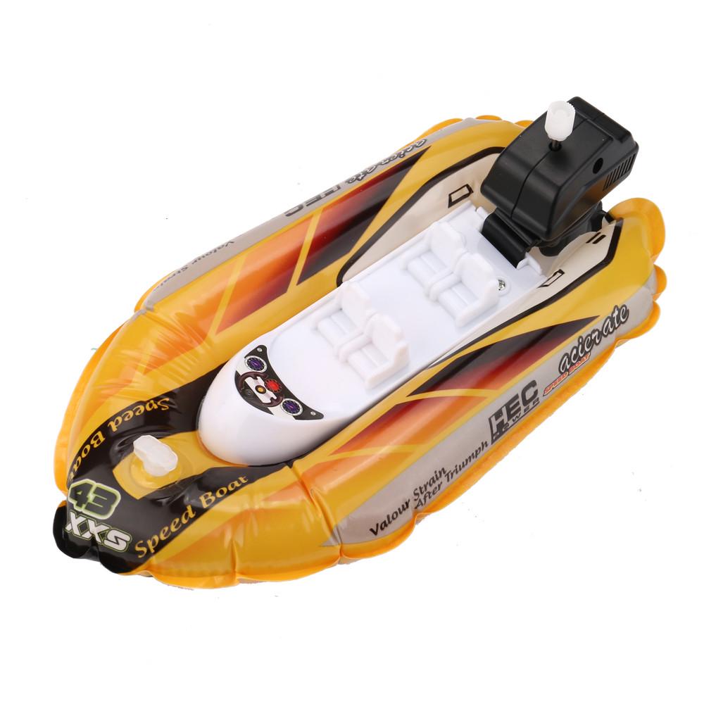 Mini inflatable yacht boat bath toy.